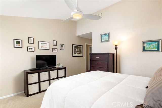 Master bedroom with vaulted ceilings.