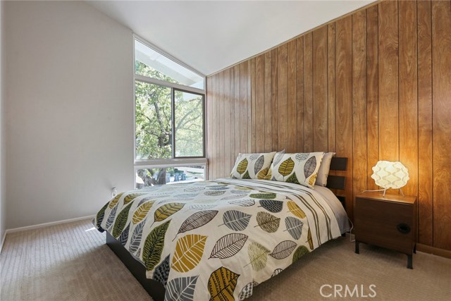 Upstairs bedroom 1 -- note vaulted ceilings