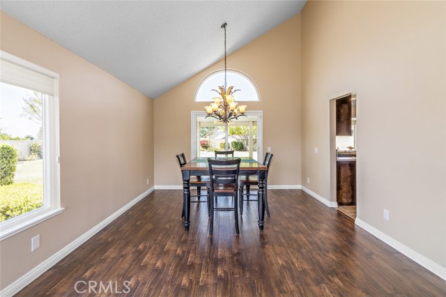 Dining room also has large windows. Gorgeous flooring!