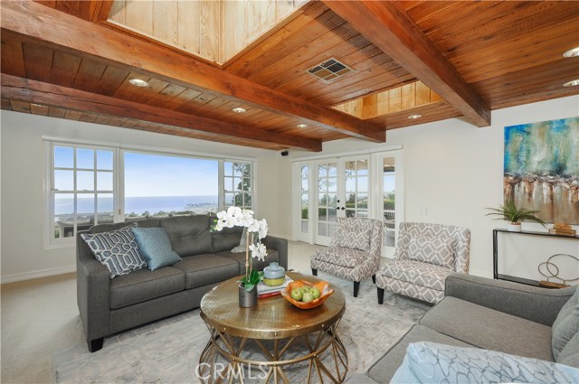 2 skylights and a fabulous view.  French doors to the rear deck/patio.