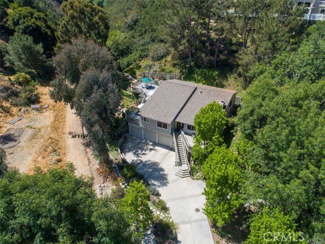 large driveway to the three car garage