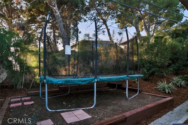 area for a trampoline or a garden in the rear of the lot