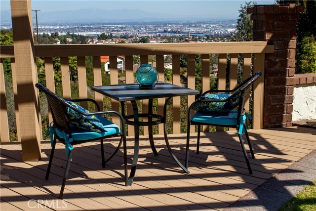 Gazebo seating area right on top of the canyon with city light and harbor views.