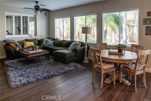 Open family room and kitchen, with a view of den/gym