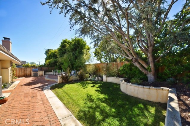 Landscaped Backyard with Grassy Area