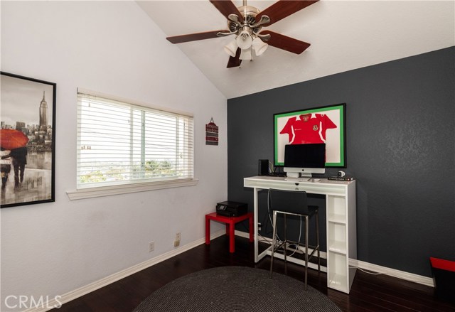Bedroom filled with natural light and soaring ceilings and abundant storage