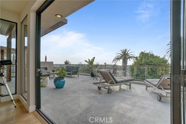 Top level, second floor open living space extending to 1k sqft Ocean View deck