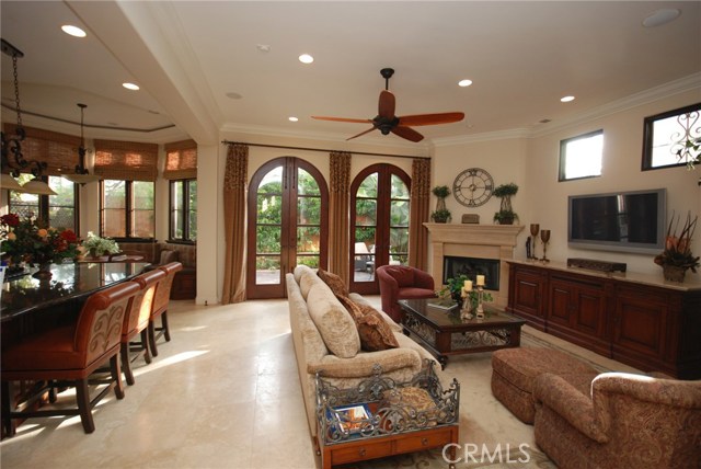 Great room with 9' arched french doors leading to backyard