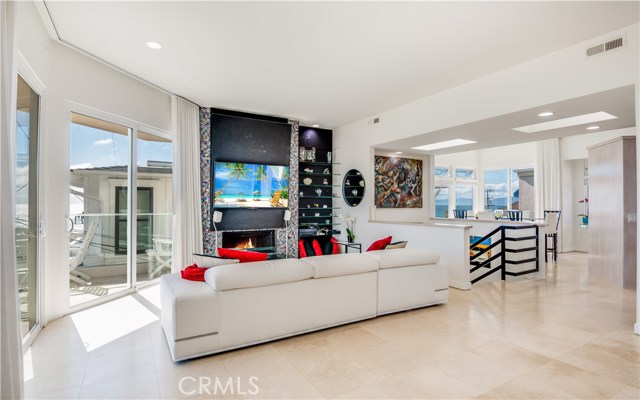 Living room looking at dining room with Malibu views
