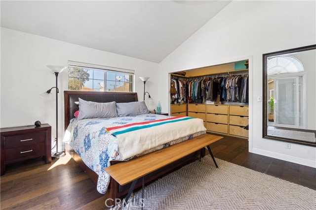 Master bedroom suite, with soaring ceilings, abundant natural light and custom closet drawers and organization