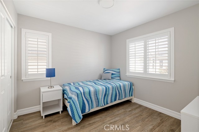 2nd bedroom with built in closet organizer 2nd bedroom with built in closet organizer