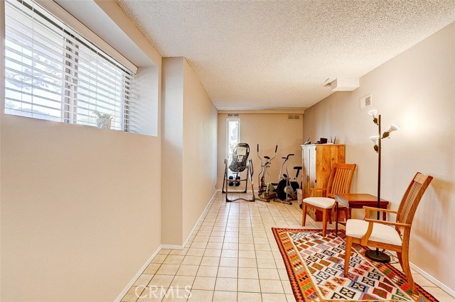 Spacious bonus room next to garage. Spacious bonus room next to garage.