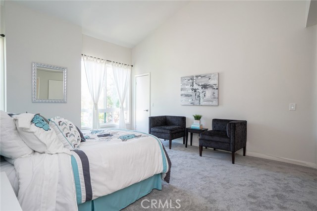 Very spacious Master Suite with Vaulted Ceilings and dual closets! Brand New Carpet