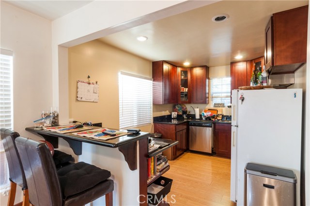 Totally upgraded kitchen in Unit #2. Breakfast bar, all new cabinetry and appliances + sunny Western exposure.