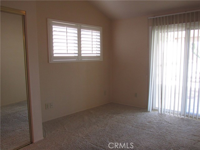 Fifth Bedroom with Sliding Doors to Backyard