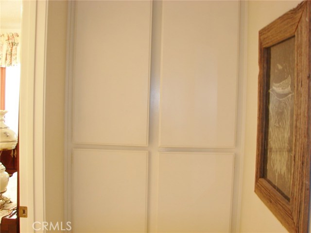 AT END OF HALLWAY IS A BANK OF LINEN CUPBOARDS. ONE OF MANY STORAGE OPTIONS THIS HOME HAS TO OFFER YOU!