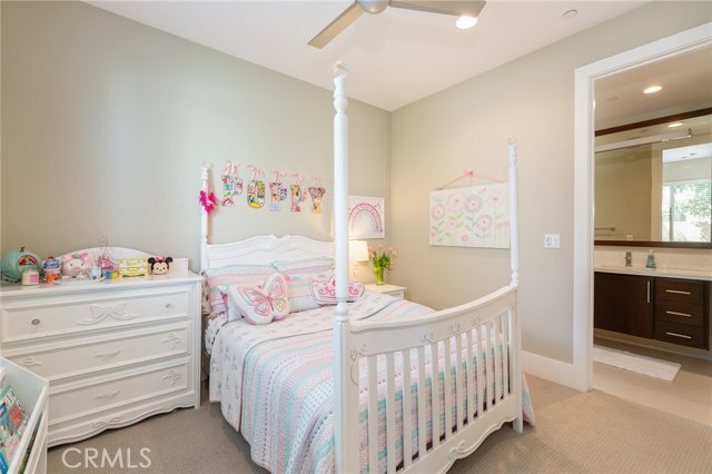 Bedroom #2 on the first level with adjoining bath and abundant storage
