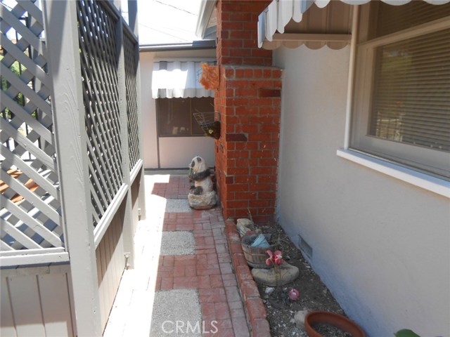 Brick Walkway Between House and Gazebo with still plenty of Flower Bed Space.
