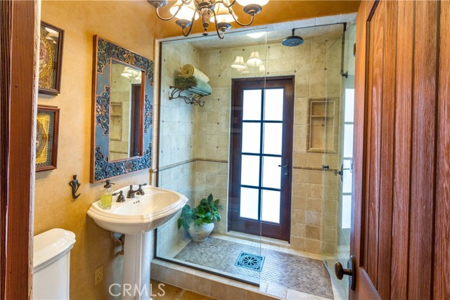 Downstairs Bathroom With French Door To Pool Area