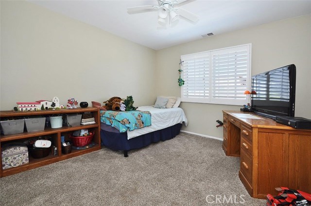 Upstairs bedroom #2 is with mirrored closet doors