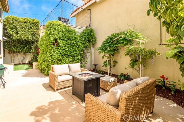 Southern facing, sun-drenched patio is ideal for entertaining or just chillin'... Very Zen-like.