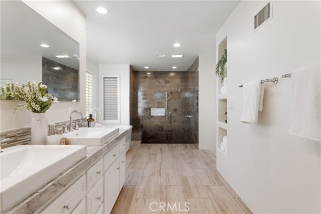 Primary suite bathroom with giant shower.