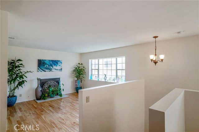 BACK HOUSE: UPSTAIRS LIVING ROOM AND GAS FIREPLACE.