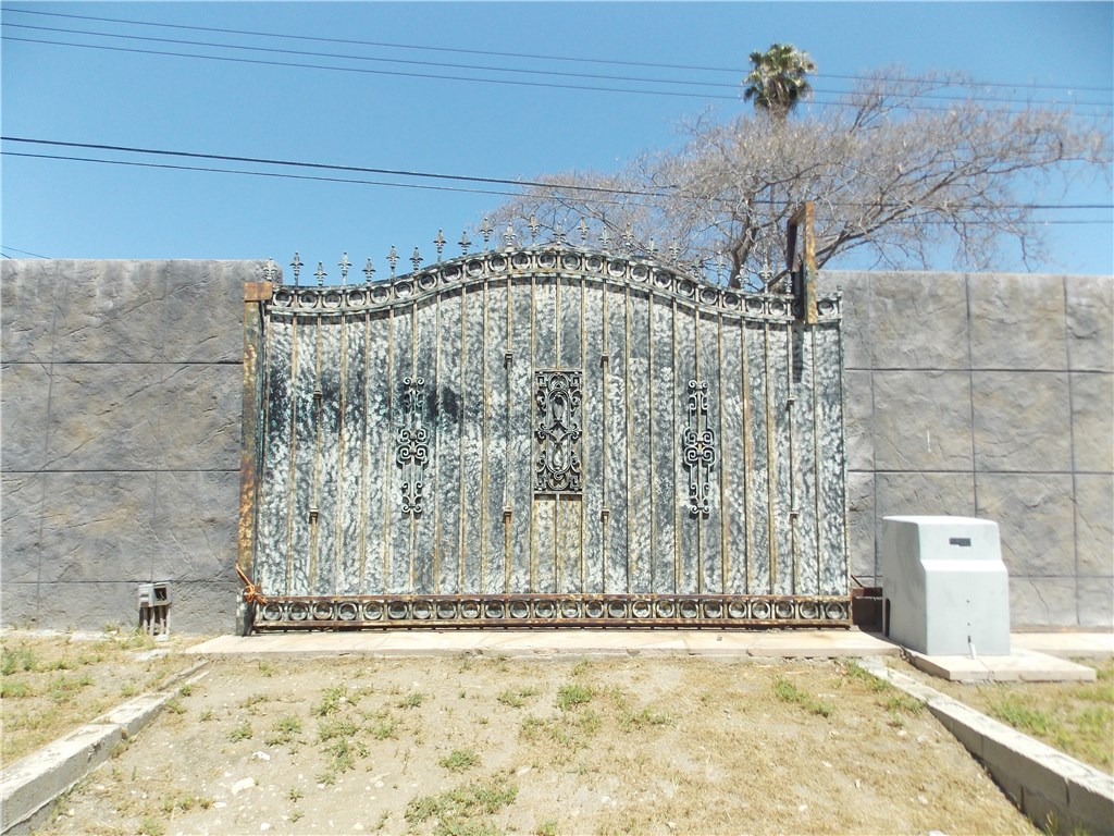 Custom electric rear gate entrance.