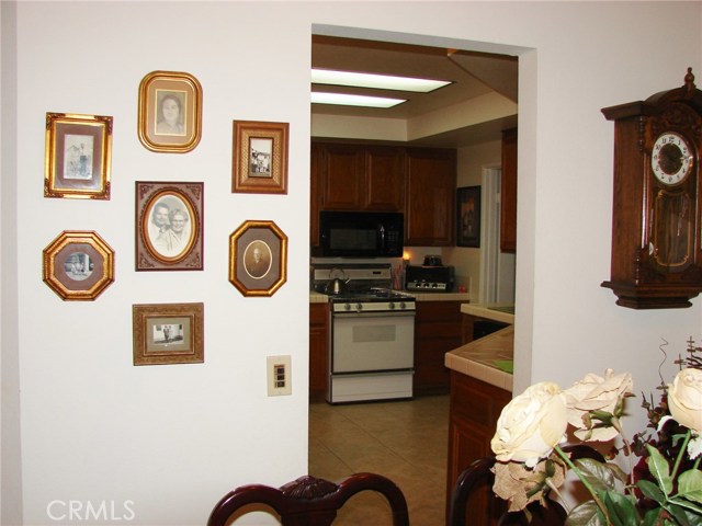 ADJOINING FORMAL DINING ROOM IS THE SPACIOUS KITCHEN. IT ALSO HAS A LARGE BREAKFAST NOOK.