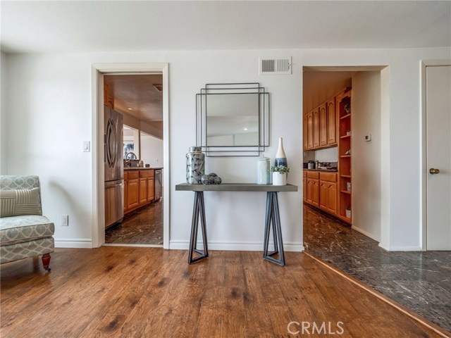 Living Room looking to two entries to Kitchen