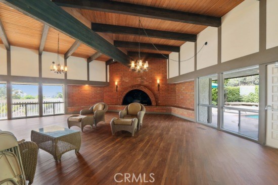 Impressive and  spacious first level of clubhouse with fireplace, soaring ceilings and wonderful views