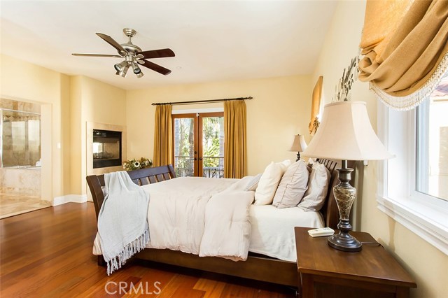 Master suite with two way fireplace leading to the large resort style bath. The master features a large private balcony which is great for enjoying your morning coffee, tea, or your own private sanctuary to catch up on some reading.