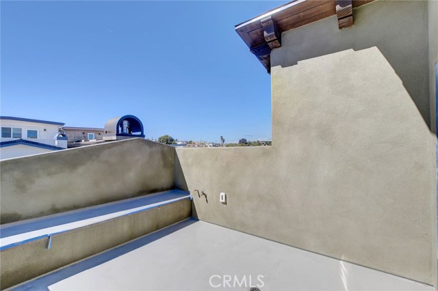3rd Level . . . Rooftop deck with built in seating