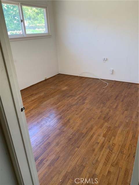 Bedroom with Hardwood Flooring