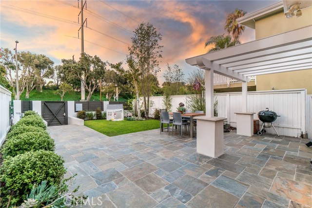 Endless sunsets and no neighbors looking in across the street; just a lush greenbelt.