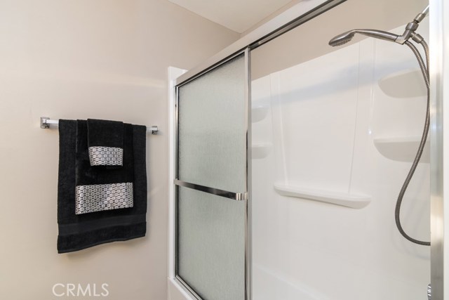 New shower in tub and guest bathroom