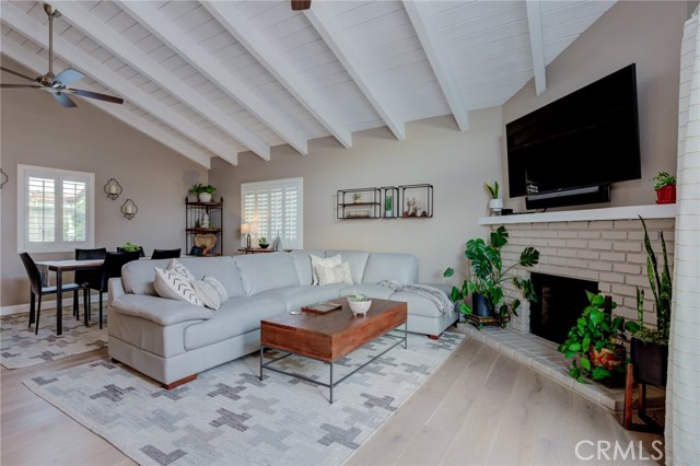Balcony access to the right of fireplace