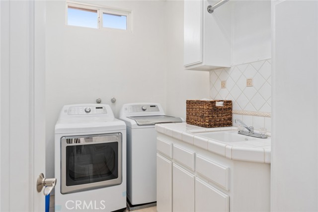 Upper level laundry room.