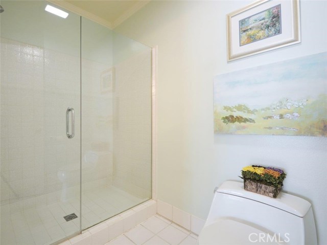 Private Master Bathroom with toilet and large shower.