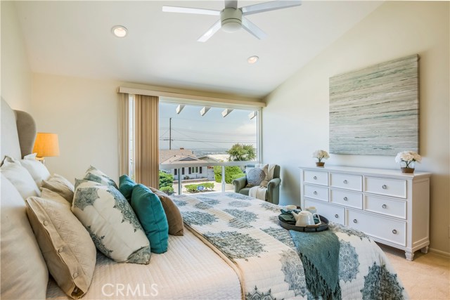 Master bedroom with view and high ceilings