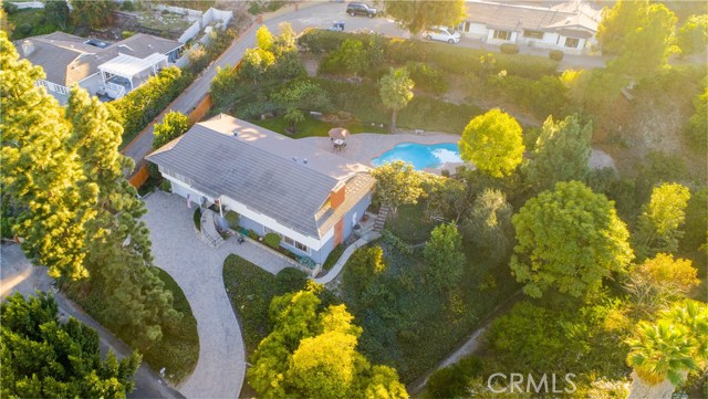 Great view of the home from above illustrating the 1/2 acre lot.