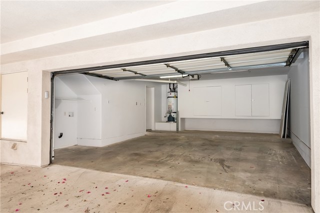 Built in cabinets and laundry area