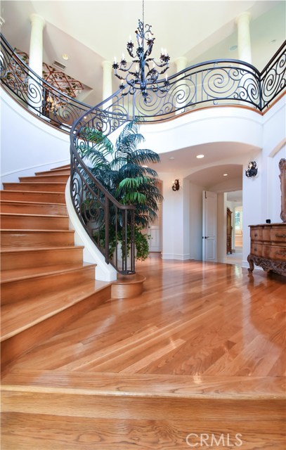 Spiral staircase to the upper level.