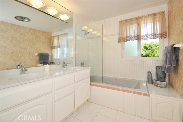 Master bathroom with his and her sinks