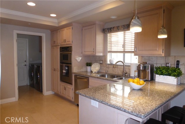 Remodeled Kitchen with view towards Laundry Room.