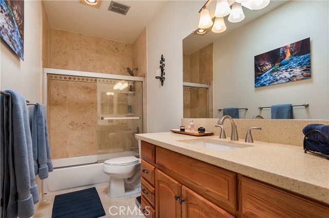 Quartz Counters, Travertine Shower and Floor Quartz Counters, Travertine Shower and Floor