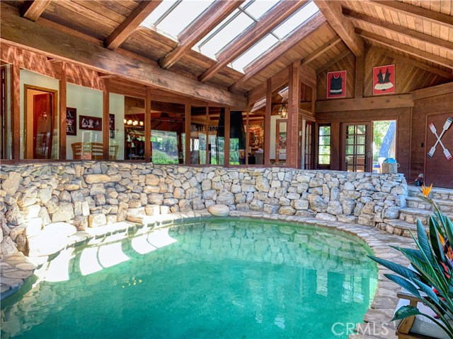 The enclosed pool features skylights that provide great natural light during the day.