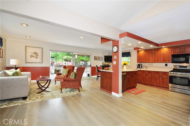  Family Room and Dining Area with Adjoining Remodeled Kitchen. Also a perfect spot for the Family Pool table.