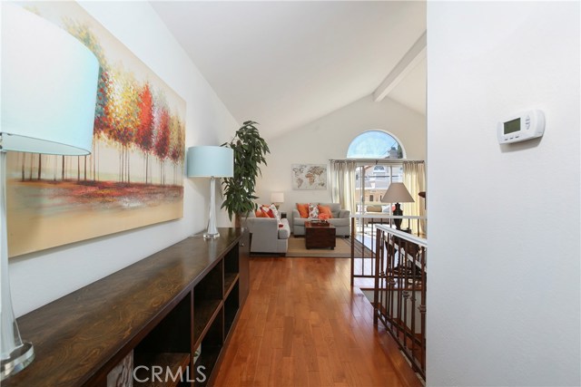 Upper Level Vaulted Ceilings, Wood Floors, and South Facing Views