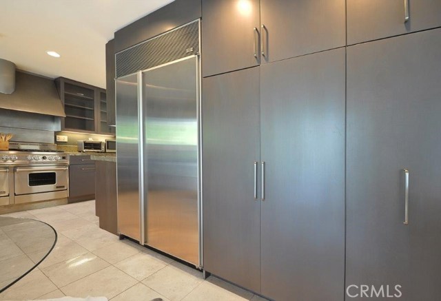 Large Built in Fridge & Many Cabinets in Kitchen